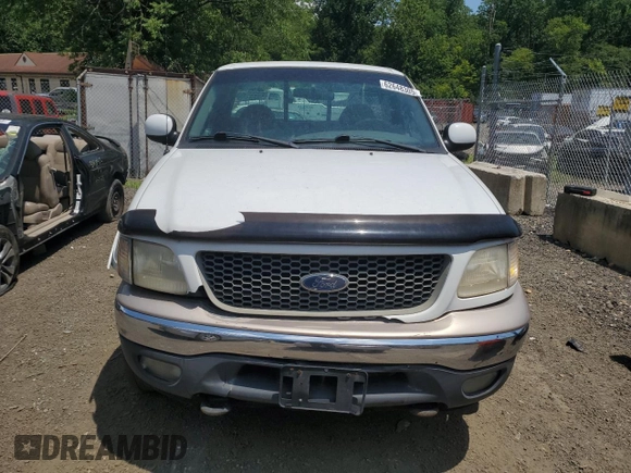 2000 Ford F-150 XL с VIN 1FTPF18L2YNA18807, выставлен на аукционе Copart как лот 62648305 с пробегом Не указан миль и Списание • Salvage title. История ставок и продаж доступна на DreamBid. Изображение 5.