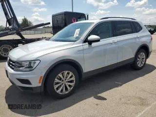 2018 Volkswagen Tiguan SEL with VIN 3VV2B7AX7JM126444, listed as a Copart auction lot 61574485 with 86,720 mi miles and Salvage title. Bid and sale history available at DreamBid. Image 1.