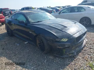 2018 Ford Mustang GT z VIN 1FA6P8CF0J5106365, wystawiony jako IAAI lot #42542363 z przebiegiem 112 397 mil mil oraz . Historia ofert i sprzedaży dostępna na DreamBid. Obrazek 1.
