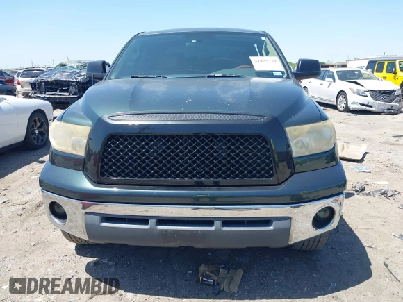 2008 Toyota Tundra with VIN 5TFET54118X024646, listed as a IAAI auction lot 41925739 with 271,062 mi miles and . Bid and sale history available at DreamBid. Image 12.