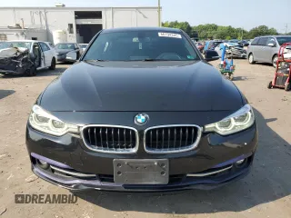 2018 BMW 3 Series 330i xDrive with VIN WBA8D9G56JNU69320, listed as a Copart auction lot 60794345 with 104,036 mi miles and Salvage title. Bid and sale history available at DreamBid. Image 5.