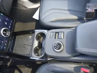 2023 Ford Mustang Mach-E Premium z VIN 3FMTK3SU3PMA70202, wystawiony jako IAAI lot #42291558 z przebiegiem 16 333 mil mil oraz . Historia ofert i sprzedaży dostępna na DreamBid. Obrazek 18.