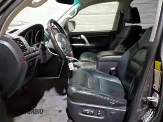 2014 Toyota Land Cruiser z VIN JTMHY7AJ9E4023269, wystawiony jako Copart lot #48291745 z przebiegiem 194 362 mil mil oraz Szkody całkowita. Historia ofert i sprzedaży dostępna na DreamBid. Obrazek 7.