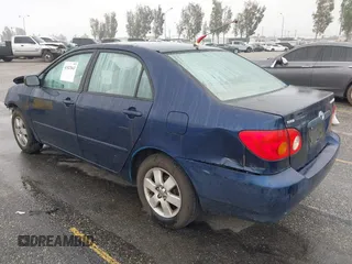 2004 Toyota Corolla CE with VIN 1NXBR32E84Z279684, listed as a IAAI auction lot 41922843 with Not Provided miles. Bid and sale history available at carsss.com. Image 3.