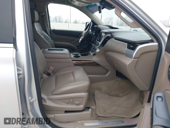 2015 GMC Yukon SLT with VIN 1GKS1BKC3FR253184, listed as a IAAI auction lot 41574610 with 152,543 mi miles. Bid and sale history available at carsss.com. Image 5.