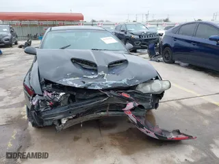 2006 Pontiac GTO with VIN 6G2VX12U46L827831, listed as a IAAI auction lot 41319936 with 102,173 mi miles. Bid and sale history available at carsss.com. Image 12.