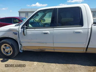 2003 Ford F-150 XLT with VIN 1FTRW07663KD57580, listed as a IAAI auction lot 41870643 with 256,497 mi miles. Bid and sale history available at carsss.com. Image 14.