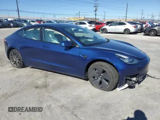 2022 Tesla Model 3 Long Range with VIN 5YJ3E1EB2NF243381, listed as a Copart auction lot 48917265 with 25,865 mi miles and Salvage Title. Bid and sale history available at DreamBid. Image 4.