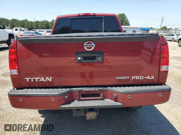 2015 Nissan Titan Pro-4X with VIN 1N6BA0EC5FN506358, listed as a Copart auction lot 56671205 with 153,712 mi miles and Salvage title. Bid and sale history available at DreamBid. Image 6.