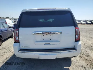 2020 GMC Yukon Denali with VIN 1GKS2CKJ0LR109590, listed as a Copart auction lot 68700384 with 55,310 mi miles and Salvage Title. Bid and sale history available at carsss.com. Image 6.