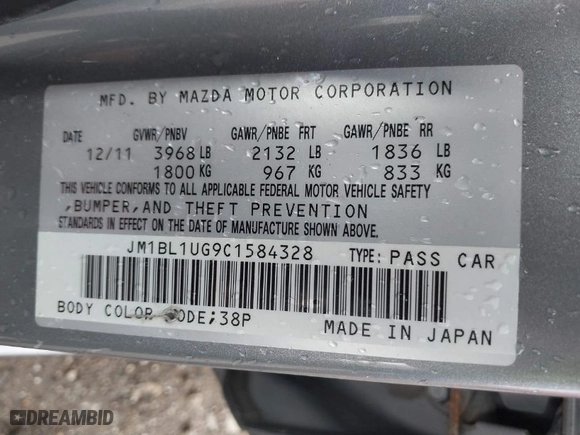 2012 Mazda Mazda3 i Sport with VIN JM1BL1UG9C1584328, listed as a IAAI auction lot 41875903 with 117,961 mi miles. Bid and sale history available at carsss.com. Image 9.