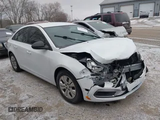 2015 Chevrolet Cruze LS z VIN 1G1PA5SH6F7137433, wystawiony jako IAAI lot #41412507 z przebiegiem 160 052 mil mil oraz . Historia ofert i sprzedaży dostępna na DreamBid. Obrazek 1.
