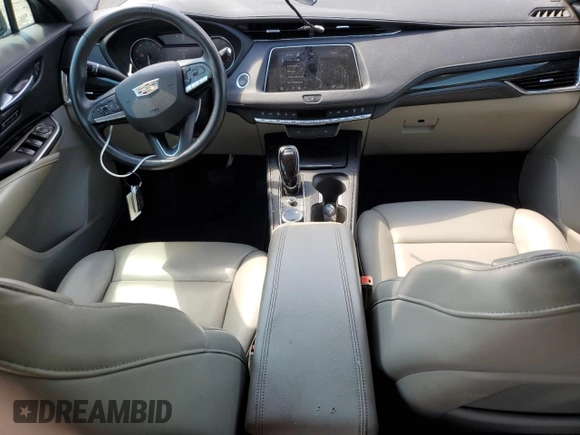 2023 Cadillac XT4 FWD Premium Luxury с VIN 1GYFZCR42PF100724, выставлен на аукционе Copart как лот 55130305 с пробегом 68 258 миль миль и Списание • Salvage title. История ставок и продаж доступна на DreamBid. Изображение 8.