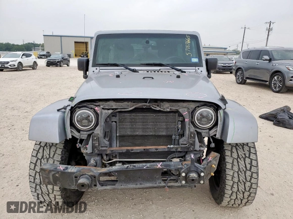 2014 Jeep Wrangler Unlimited Rubicon с VIN 1C4HJWFG3EL322449, выставлен на аукционе Copart как лот 57187665 с пробегом 122 469 миль миль и Списание • Salvage title. История ставок и продаж доступна на DreamBid. Изображение 5.