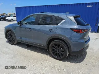 2024 Mazda CX-5 S Carbon Edition z VIN JM3KFBCL3R0481732, wystawiony jako Copart lot #56997135 z przebiegiem 32 887 mil mil oraz Tytuł czysty. Historia ofert i sprzedaży dostępna na DreamBid. Obrazek 2.