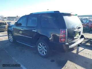 2009 GMC Yukon Denali with VIN 1GKFK03249R163622, listed as a IAAI auction lot 41279580 with 185,441 mi miles. Bid and sale history available at carsss.com. Image 3.