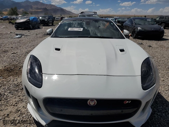 2016 Jaguar F-TYPE R with VIN SAJWJ6DL9GMK27674, listed as a Copart auction lot 68377194 with 55,074 mi miles and Salvage Title. Bid and sale history available at carsss.com. Image 5.