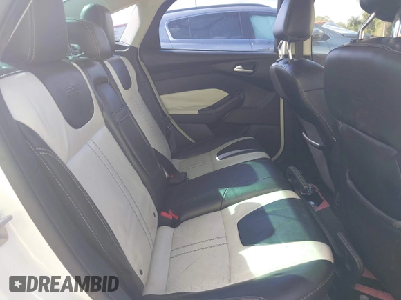 2012 Ford Focus SEL with VIN 1FAHP3H25CL282490, listed as a IAAI auction lot 40563360 with 223,864 mi miles. Bid and sale history available at carsss.com. Image 8.