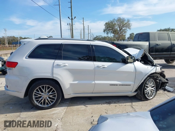 2018 Jeep Grand Cherokee Summit with VIN 1C4RJEJG3JC394624, listed as a IAAI auction lot 41412939 with 80,180 mi miles and . Bid and sale history available at DreamBid. Image 13.