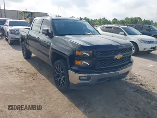 2015 Chevrolet Silverado 1500 LT with VIN 3GCPCREC3FG477250, listed as a IAAI auction lot 42150823 with 169,036 mi miles and . Bid and sale history available at DreamBid. Image 1.