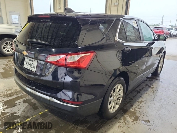 2021 Chevrolet Equinox LT with VIN 2GNAXJEV4M6161787, listed as a IAAI auction lot 42575859 with 108,332 mi miles and . Bid and sale history available at DreamBid. Image 14.