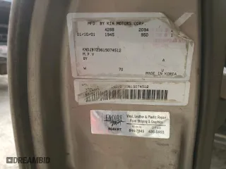 2001 Kia Sportage with VIN KNDJB723615074512, listed as a Copart auction lot 75190414 with 189,482 mi miles and Salvage Title. Bid and sale history available at carsss.com. Image 13.