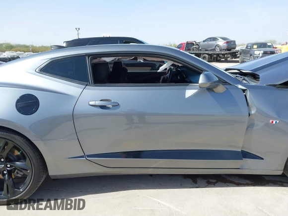 2021 Chevrolet Camaro 1LT z VIN 1G1FB1RX9M0125698, wystawiony jako IAAI lot #41824653 z przebiegiem 69 365 mil mil oraz . Historia ofert i sprzedaży dostępna na DreamBid. Obrazek 14.