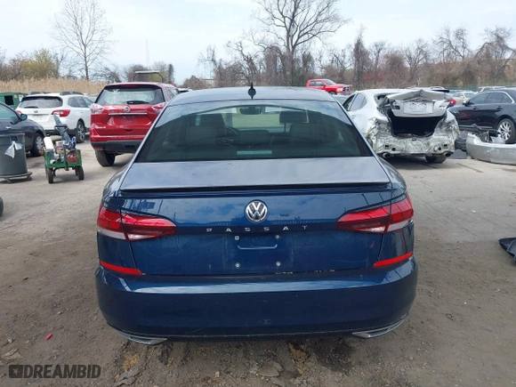 2021 Volkswagen Passat 2.0T R-Line with VIN 1VWMA7A35MC018415, listed as a IAAI auction lot 41908608 with 61,669 mi miles. Bid and sale history available at carsss.com. Image 16.