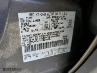 2002 Ford Escape Limited with VIN 1FMCU04122KD65674, listed as a Copart auction lot 56336504 with 199,739 mi miles and Salvage Title. Bid and sale history available at carsss.com. Image 12.