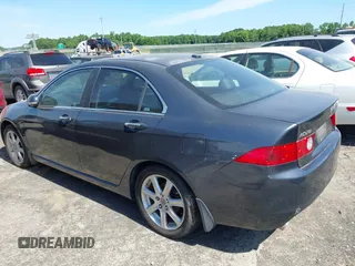 2005 Acura TSX with VIN JH4CL96935C016390, listed as a IAAI auction lot 42296236 with 125,033 mi miles and . Bid and sale history available at DreamBid. Image 14.