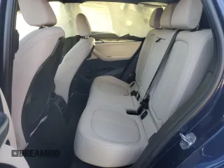 2018 BMW X1 xDrive28i with VIN WBXHT3C32J3H31391, listed as a Copart auction lot 88584855 with 32,441 mi miles and Salvage Title. Bid and sale history available at DreamBid. Image 12.
