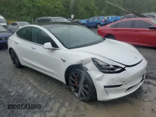 2020 Tesla Model 3 Performance z VIN 5YJ3E1EC9LF784594, wystawiony jako Copart lot #56179955 z przebiegiem 97 419 mil mil oraz Szkoda całkowita • Salvage title. Historia ofert i sprzedaży dostępna na DreamBid. Obrazek 4.