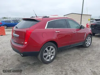 2012 Cadillac SRX Performance Collection with VIN 3GYFNBE36CS527333, listed as a IAAI auction lot 41910224 with 144,446 mi miles. Bid and sale history available at carsss.com. Image 4.