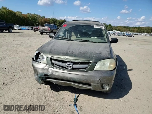 2002 Mazda Tribute LX with VIN 4F2YU09122KM62196, listed as a Copart auction lot 77327034 with 256,385 mi miles and Salvage Title. Bid and sale history available at carsss.com. Image 11.