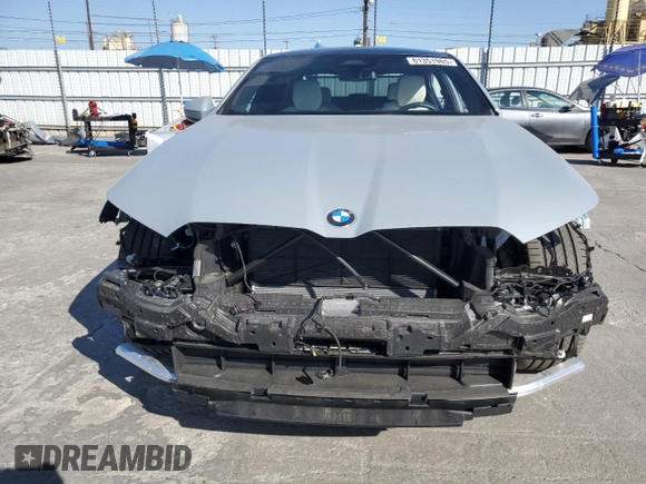 2024 BMW 5 Series 530i with VIN WBA43FJ06RCP67824, listed as a Copart auction lot 61351965 with 12,990 mi miles and Salvage title. Bid and sale history available at DreamBid. Image 5.