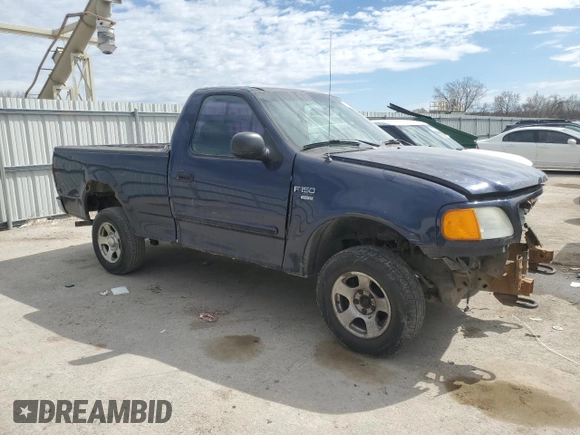 2004 Ford F-150 XL with VIN 2FTRF18W14CA74904, listed as a Copart auction lot 50361935 with 163,684 mi miles and Salvage title. Bid and sale history available at DreamBid. Image 4.