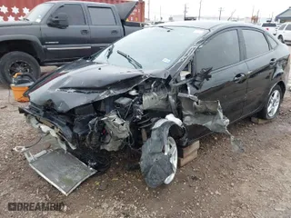2017 Ford Fiesta SE with VIN 3FADP4BJ7HM137543, listed as a IAAI auction lot 41555369 with 141,780 mi miles. Bid and sale history available at carsss.com. Image 6.