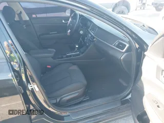 2017 Kia Optima LX with VIN 5XXGT4L30HG152700, listed as a IAAI auction lot 41826259 with 143,438 mi miles. Bid and sale history available at carsss.com. Image 5.
