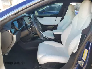 2019 Tesla Model S 100D with VIN 5YJSA1E40KF332077, listed as a Copart auction lot 53733965 with 33,098 mi miles and Salvage title. Bid and sale history available at DreamBid. Image 7.