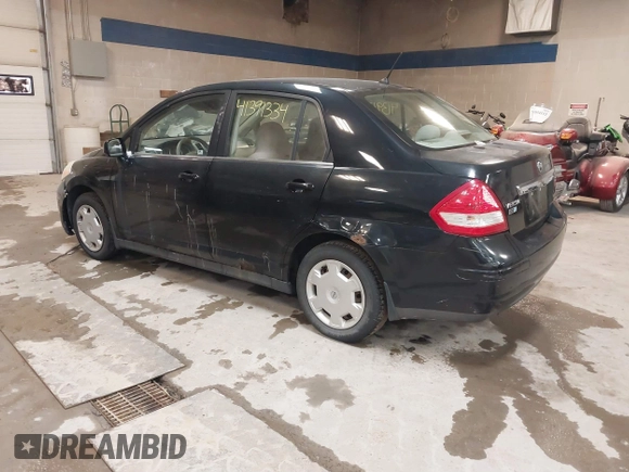 2007 Nissan Versa 1.8 SL with VIN 3N1BC11E47L411983, listed as a IAAI auction lot 41391334 with 201,830 mi miles. Bid and sale history available at carsss.com. Image 3.