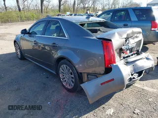 2012 Cadillac CTS Premium with VIN 1G6DS5E3XC0128264, listed as a IAAI auction lot 41964295 with 117,889 mi miles and . Bid and sale history available at DreamBid. Image 3.