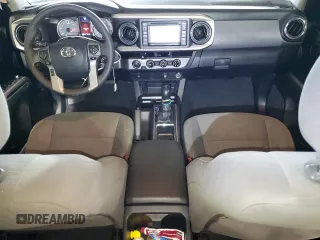 2017 Toyota Tacoma SR5 with VIN 5TFCZ5AN8HX067720, listed as a Copart auction lot 84801184 with 76,148 mi miles and Salvage title. Bid and sale history available at DreamBid. Image 8.