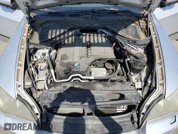 2012 BMW X5 35i with VIN 5UXZV4C5XCL749204, listed as a Copart auction lot 62012985 with 94,636 mi miles and Clean title. Bid and sale history available at DreamBid. Image 12.