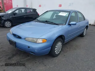 1996 Ford Contour LX с VIN 1FALP6534TK196831, выставлен на аукционе IAAI как лот 41895630 с пробегом 158 477 миль миль и . История ставок и продаж доступна на DreamBid. Изображение 2.