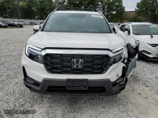 2023 Honda Passport EX-L with VIN 5FNYF8H58PB015048, listed as a Copart auction lot 66259043 with 7,142 mi miles. Bid and sale history available at carsss.com. Image 5.