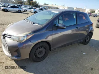 2015 Toyota Yaris L with VIN VNKJTUD31FA053128, listed as a Copart auction lot 41911495 with 85,891 mi miles and Salvage Title. Bid and sale history available at carsss.com. Image 1.