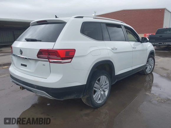 2019 Volkswagen Atlas SE z VIN 1V2WR2CA9KC593891, wystawiony jako IAAI lot #41947078 z przebiegiem 74 525 mil mil oraz . Historia ofert i sprzedaży dostępna na DreamBid. Obrazek 4.