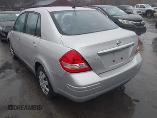 2008 Nissan Versa 1.8 S with VIN 3N1BC11E78L402230, listed as a IAAI auction lot 41939496 with 311,341 mi miles. Bid and sale history available at carsss.com. Image 3.
