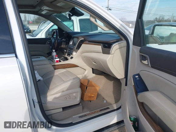 2020 GMC Yukon XL Denali with VIN 1GKS1HKJ6LR282854, listed as a IAAI auction lot 41717072 with 56,715 mi miles and . Bid and sale history available at DreamBid. Image 5.