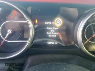 2018 Jeep Wrangler Unlimited Rubicon z VIN 1C4HJXFN3JW236121, wystawiony jako Copart lot #60930565 z przebiegiem 128 727 mil mil oraz Szkoda całkowita • Salvage title. Historia ofert i sprzedaży dostępna na DreamBid. Obrazek 9.